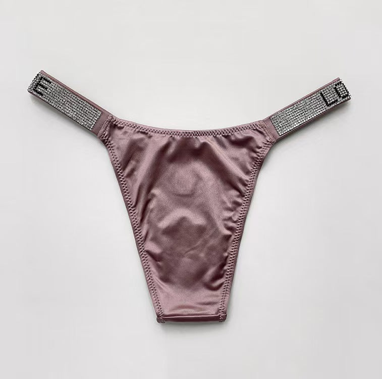Tanga taille basse à strass